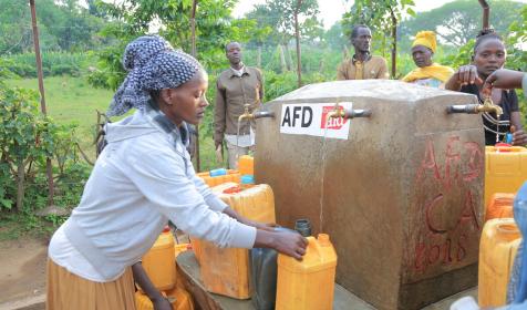 Nibabo Beniyam, 35, collecting water, from a nearby water point, constructed by Christian Aid / Action For Development (AFD), in Malle Woreda, South Omo zone. She is a mother to six children.