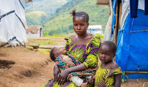 Chance and two of her young daughters at Katashola camp in Kalehe, DRC