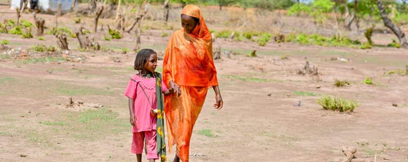 Shede and 6 year old daughter, Saida. They are refugees at Wedweil Refugee Settlement. They fled their home in Darfur in December 2023 when homes were being bombed, and food was in short supply.