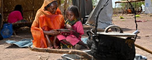 Shede and 6 year old daughter, Saida. They are refugees at Wedweil Refugee Settlement. They fled their home in Darfur in December 2023 when homes were being bombed, and food was in short supply.